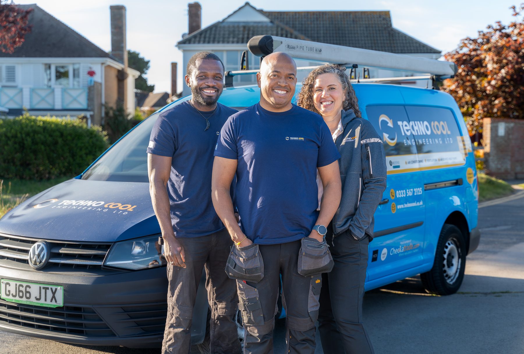 TechnoCool Engineering full team with branded van